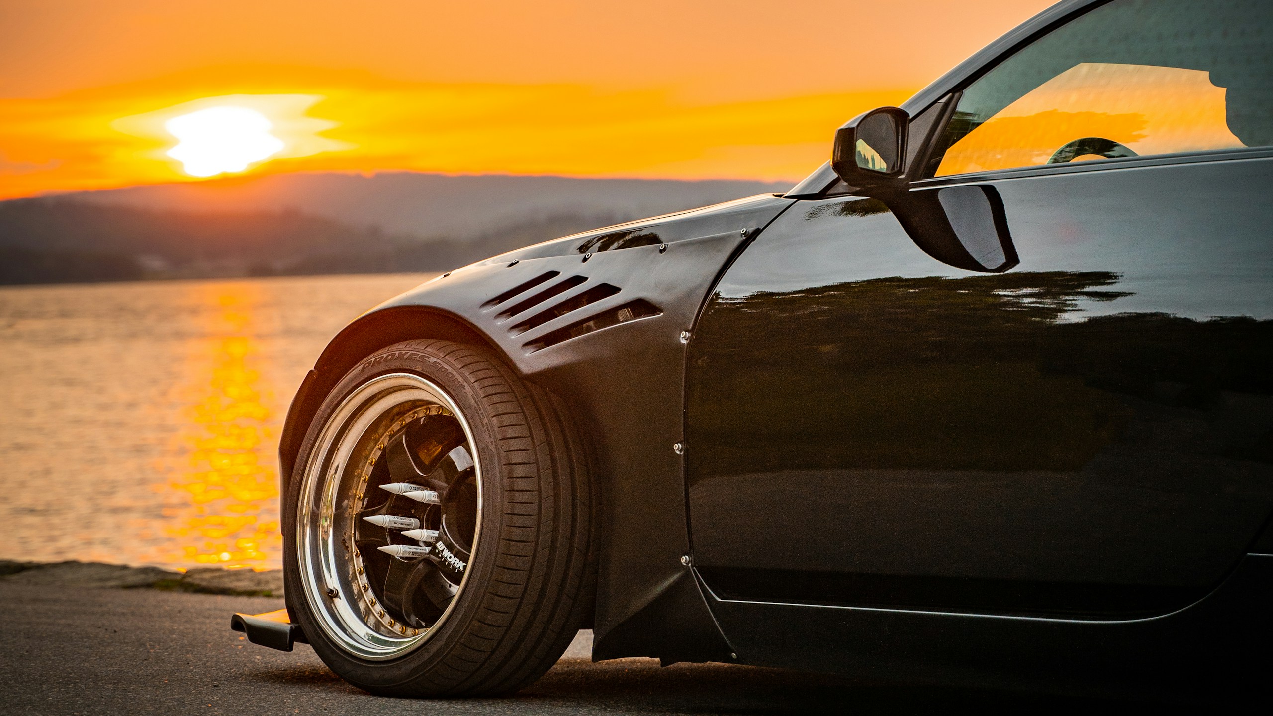 Luxury vehicle in dramatic lighting